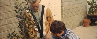 Diana with Grandpa Frank Gardening