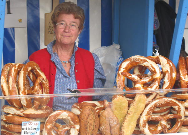 Street Food around the world pretzel lady at Oktoberfest.