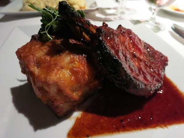 Pork Chop and Smoked Cheddar Potato Tower at Aerie Restaurant in Grand Traverse Resort