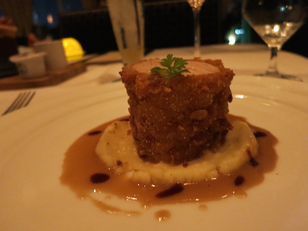 Tomato Encrusted Chilean Sea Bass at the Bull & Bear Orlando