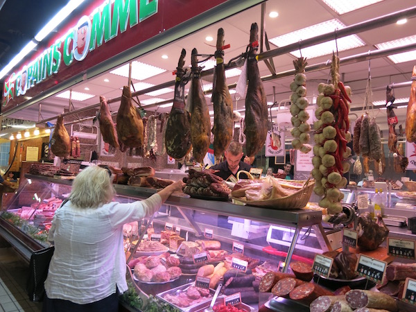 meat-vendor-at-victor-hugo-market-tolouse-france