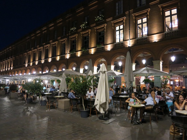 Relax at an outdoor cafe in Toulouse, France