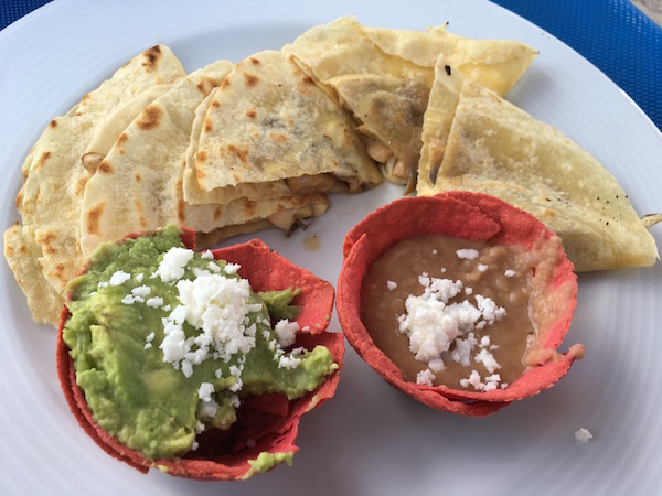 Poolside snack at El Cid Resorts Food Travelist