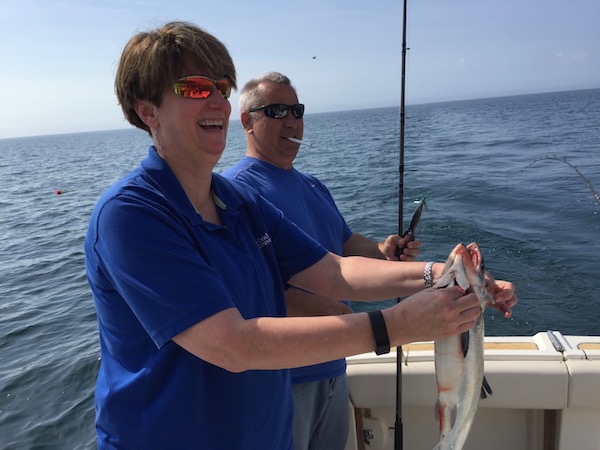 Sue Catching Coho Salmon Fishing Lake Michigan In Kenosha