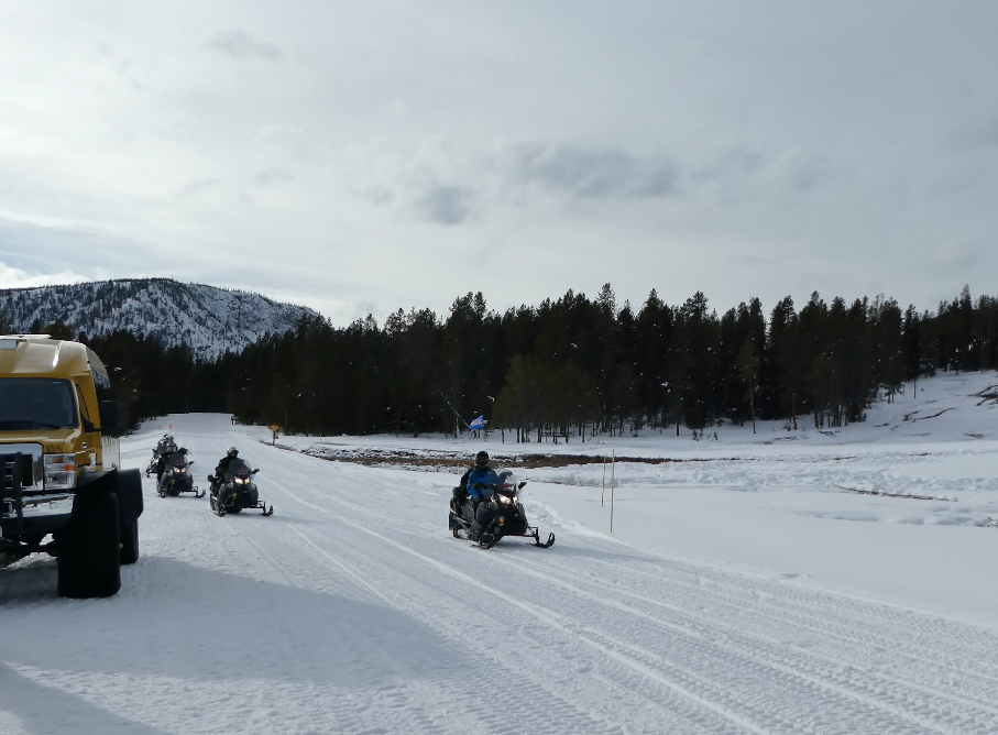 Snowmobiling caravan in Yellowstone NPS
