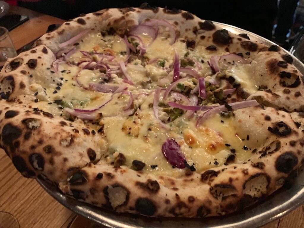 Red Onion and Pistachio Pizza at Mani Osteria Ann Arbor Michigan