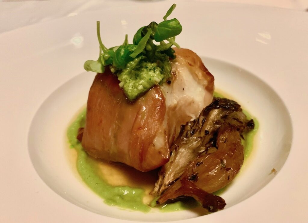 Sea bass wrapped in country ham at the Grand Geneva