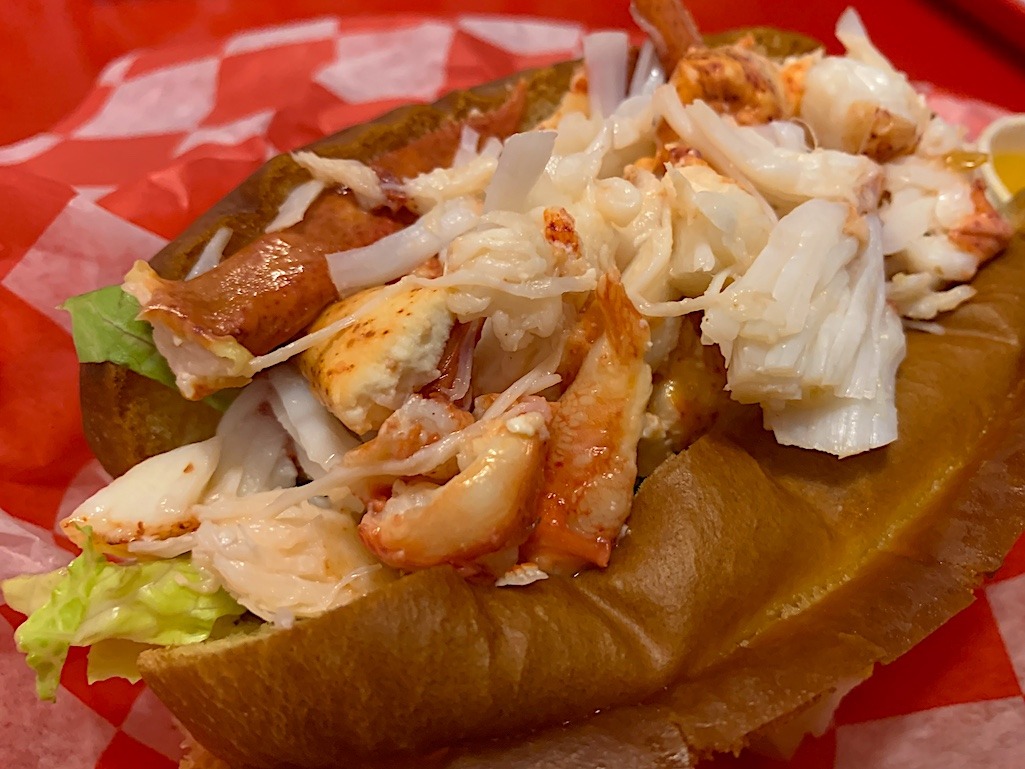 Delicious Lobster Roll at High Roller Portland Maine Best Places To Visit For Food Travel