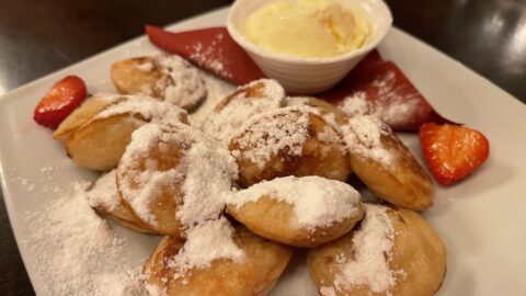 https://foodtravelist.com/wp-content/uploads/2023/07/Poffertjes-Mini-Pancakes-Dutch-480x270.jpeg