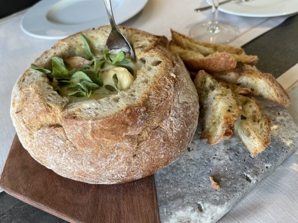 Baked cheese bowl in at Evora Vitoria Stone Hotel.